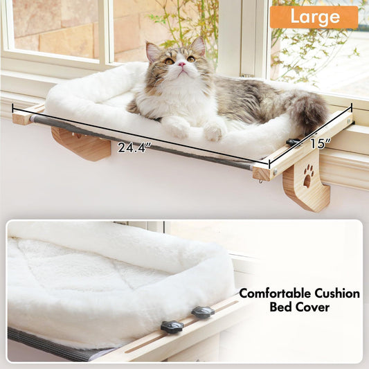 Cat resting in window hammock perch
