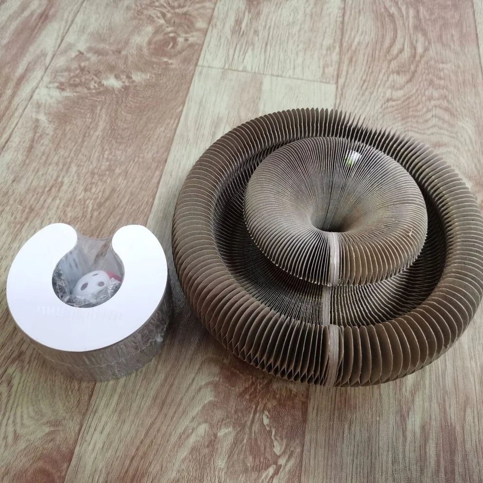 Corrugated paper cat scratcher with included cat toy