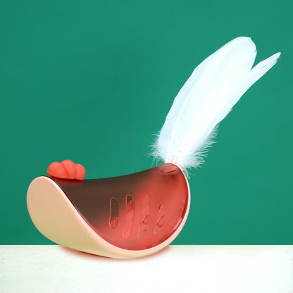 Pink cat tumbler toy with feather attachment