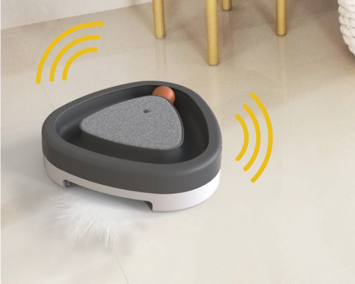 Interactive automatic cat toy shown during cat play