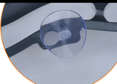 Close-up of the suction cup on a windowsill cat track ball toy