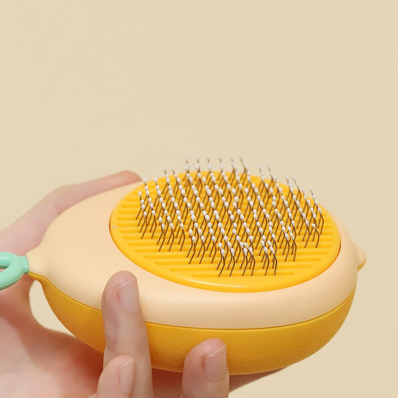 Non-slip handle on pet grooming brush