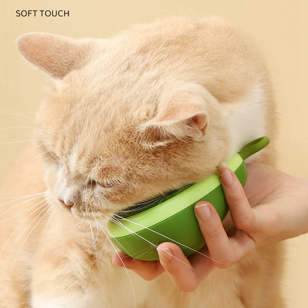 Grooming brush button releasing collected hair